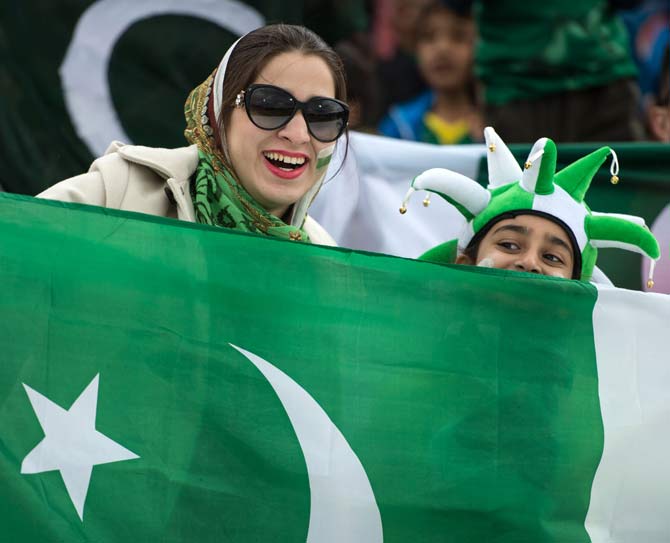 Pakistan fans cheer for their team