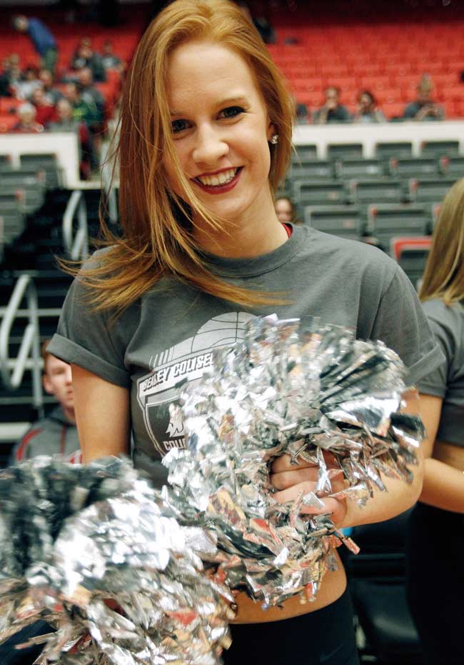 A cheerleader for the Washington State Cougars performs during the game against the Oregon Ducks at Beasley Coliseum