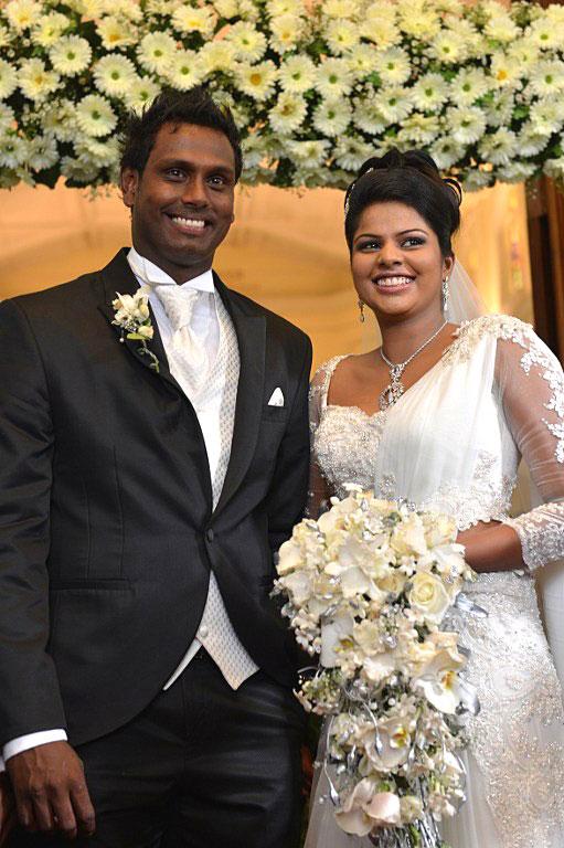 Angelo Mathews-Heshani Sri Lankan cricketer Angelo Mathews exchanged wedding vows with Heshani at a Roman Catholic Church in Colombo on July 18, 2013. The couple has two children. The Pic/ AFP