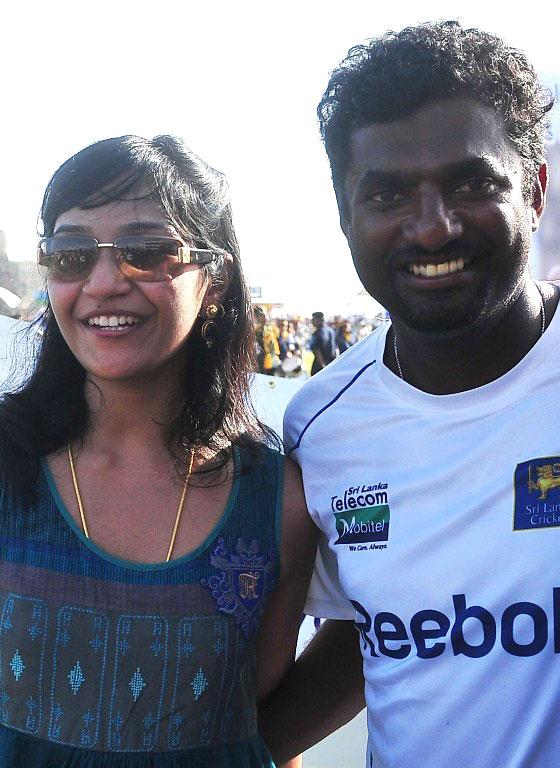 Muttiah Muralitharan-Madhimalar Former Sri Lankan cricketer Muttiah Muralitharan poses for a photo with his wife Madhimalar after his team won the first Test match between Sri Lanka and India at The Galle International Cricket Stadium in Galle on July 22, 2010. Pic/ AFP