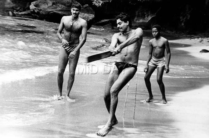 In picture: Dilip Vengsarkar, bats during a game of beach cricket as Ravi Shastri watches on in the West Indies in 1989