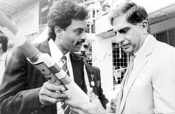 In picture: Dilip Vengsarkar showing an autographed bat to Ratan Tata during his benefit match (India vs West Indies ODI) in 1994