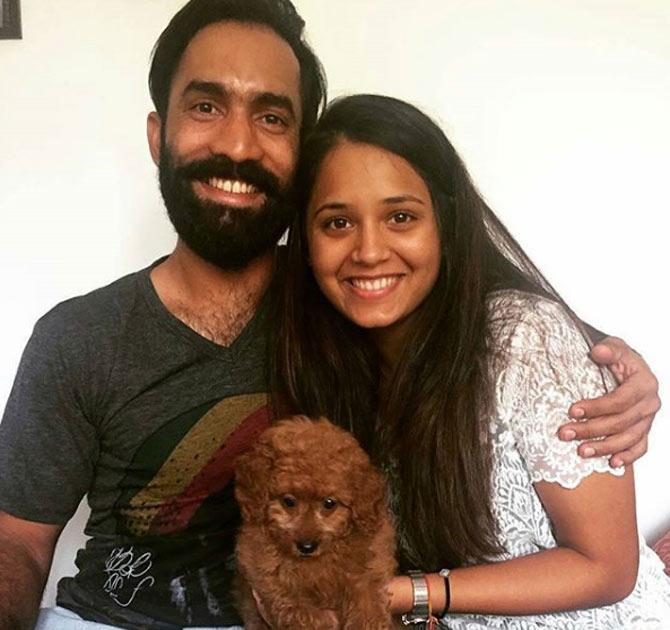 Dinesh Karthik in recent times has been in fine form and has taken his game to the next level. In pic: Dinesh Karthik with Dipika Pallikal and their pet dog