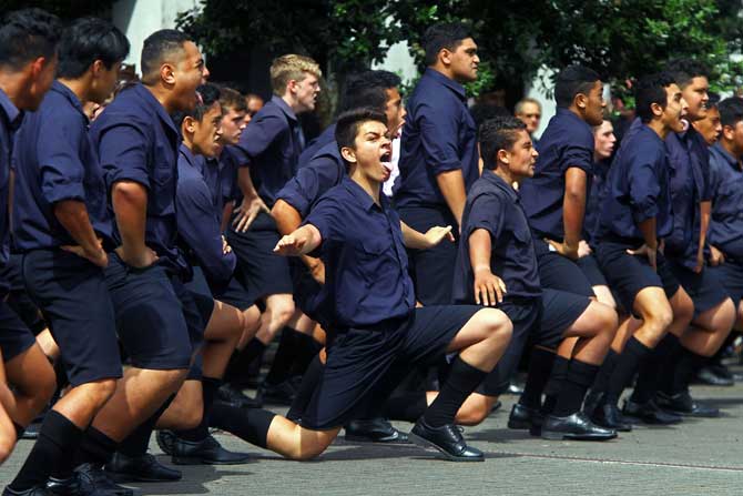 A group of Auckland Grammar School students performed a stirring rendition of the haka after Crowe's funeral on Friday. The group, dressed in their uniforms, performed the traditional, ancestral Maori war cry dance that they nicknamed 'Hogan's Haka'. 