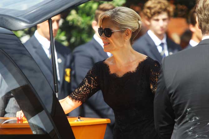 Martin Crowe's wife, Lorraine Downes, bids farewell to the former New Zealand Cricketer during his funeral at the Holy Trinity Cathedral in Auckland on Friday.