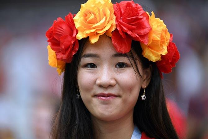 A Spain's fan smiles before the Russia 2018 World Cup round of 16 football match between Spain and Russia at the Luzhniki Stadium in Moscow on July 1, 2018.