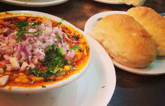 Its a traditional Maharashtrian dish that has grabbed serious attention of non-Mumbaikars too. Packed with flavours and nutrition, Misal Pav serves as a good breakfast item. The biggest attraction of the dish is the spicy misal garnished with onions, tomatoes and mixed farsan. Some best food junctions in Mumbai that offer delicious Misal Pav are Anand Bhuvan (Ganpat Kadam Marg, Lower Parel), Aaram (opposite C.S.T railway terminus), and Mamledar Misal (Naupada, Thane West).