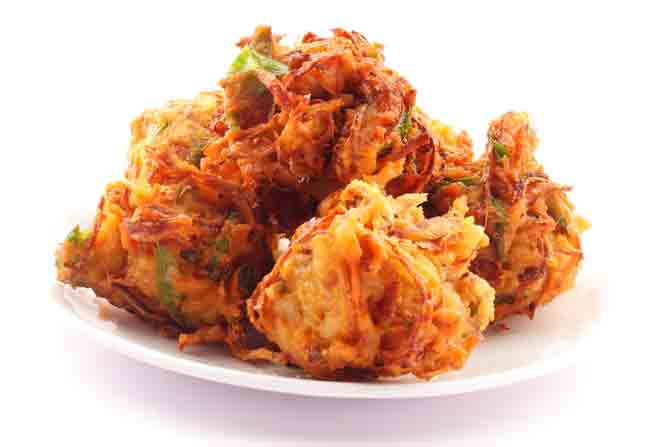 Commonly known as onion pakoda, this Mumbai snack is best savoured during monsoon over a cup of hot ginger tea. The plates of crunchy onion balls are generally served with tamarind and coriander chutney to enhance the eating experience. Two best places to try kanda bhaji in Mumbai are Chai-Coffi (Versova, Andheri West), Chai Pe Charcha (Lower Parel).