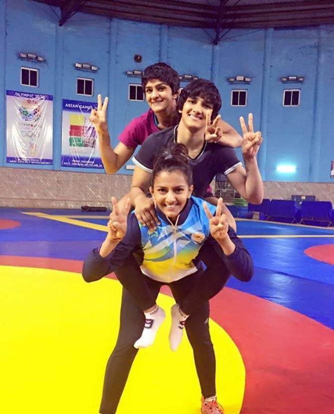 Geeta Phogat with her sisters Sangita and Ritu during a training session