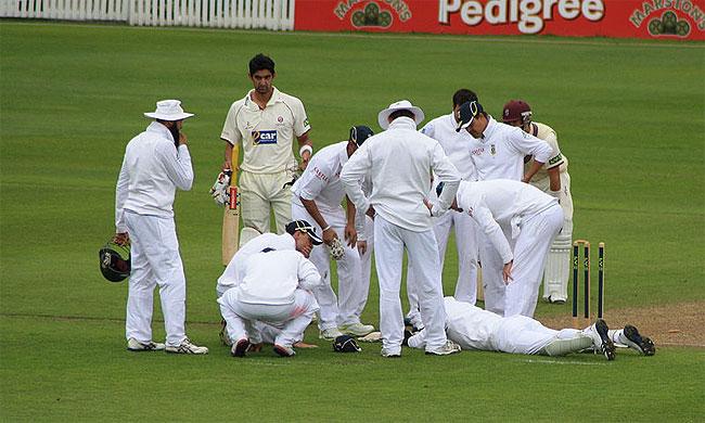 Former South African wicket-keeper Mark Boucher suffered a freak and gruesome injury when a bail flew up and hit him while playing in a warm-up match against Somersetin 2012. The incident forced Boucher to retire from international cricket  Image caption: Boucher is surrounded by the South African team immediately after suffering his eye injury against Somerset in 2012. Image: Wikipedia  