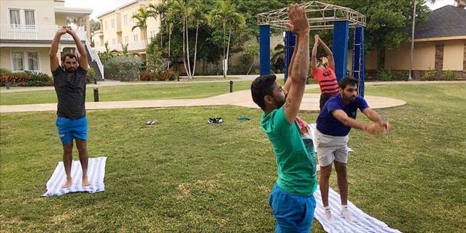  Team India players taking part in an outdoor yoga session in St Kitts in West Indies on Friday. 