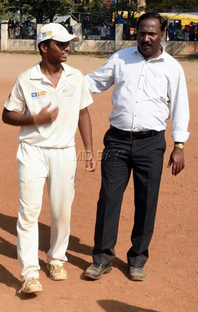 Pranav Dhanawade has been playing cricket since five under the tutelage of experienced MCA coach Mobin Sheikh (right)