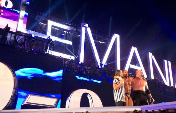 Shawn Michaels with Triple H and The Undertaker after their match at WrestleMania 28
