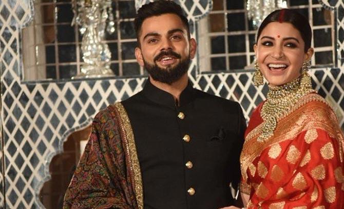 Virat Kohli and Anushka Sharma in a candid moment during their wedding reception. (Pic/ Suresh Raina Instagram)