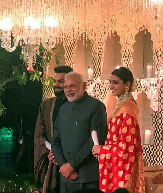 Virat Kohli and Anushka Sharma with PM Narendra Modi. Pic/ PTI
