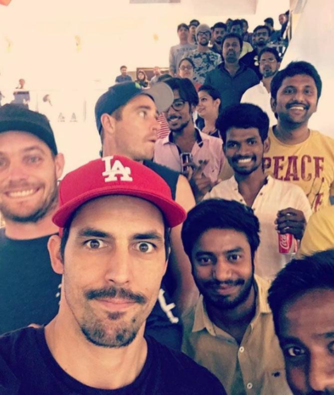 Mitchell Johnson takes a selfie with MI fans