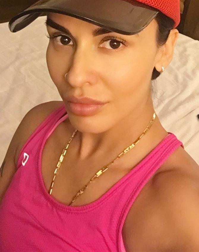 Ayesha Dhawan is the wife of India's opening batsman Shikhar Dhawan. She is also an amateur boxer. They were in a relationship for a few years before getting hitched in 2012. The couple has a son Zoravar and two daughters from Ayesha's previous marriage.