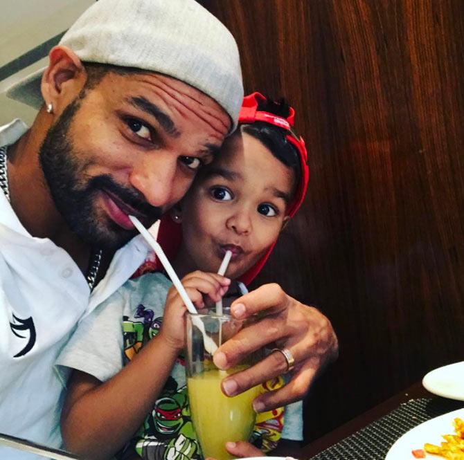 Shikhar Dhawan got married to Australian Ayesha Mukherjee in 2012 and the couple had a son, Zoravar, in 2014. Ayesha also has two daughters, Rhea and Aliyah, from her first marriage. Pic/ Shikhar Dhawan's Instagram In pic: India's opening batsman Shikhar Dhawan with his son Zoravar.