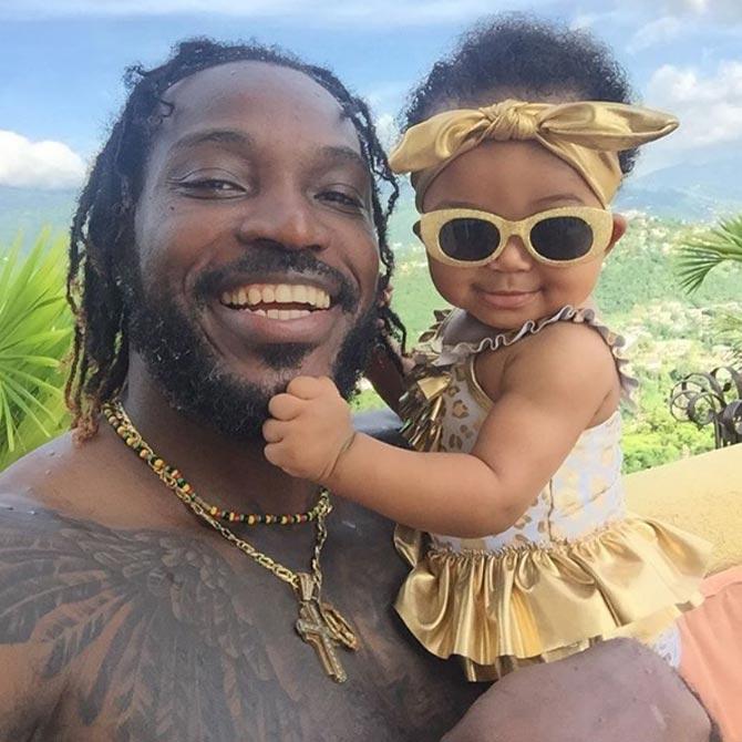 Chris Gayle and his longtime partner Natasha Berridge welcomed a baby girl in 2016. Earlier, Chris Gayle told everyone that his daughter's name was Blush but later revealed her real name Kris-Allyna Gayle. Pic/ Gayle's Instagram In pic: West Indies star and Punjab T20 player Chris Gayle with his daughter Kris-Allyna.