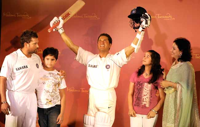 Sachin Tendulkar and Anjali met through a common friend and dated for five years before getting married in 1995. Their daughter, Sara Tendulkar, was born in October 1997 while son, Arjun, was born in September 1999 In pic: Former Indian cricketer and Mumbai mentor Sachin Tendulkar along with his son Arjun, daughter Sara and wife Anjali, pose with his waxwork figure.