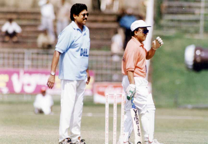 Kapil Dev with Sunil Gavaskar during a match between film actors and cricketers