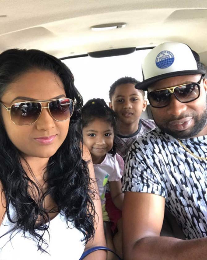 In picture: Kieron Pollard all set for a drive with his wife Jenna and their children In picture: Kieron Pollard all set for a drive with his wife Jenna and their children