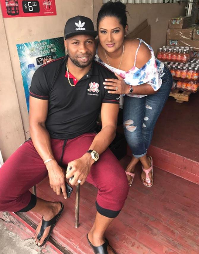 Kieron Pollard may be one to watch out for on the cricket pitch, but it looks like off it, he is a softie In picture: Pollard with his wife Kieron Pollard may be one to watch out for on the cricket pitch, but it looks like off it, he is a softie In picture: Pollard with his wife