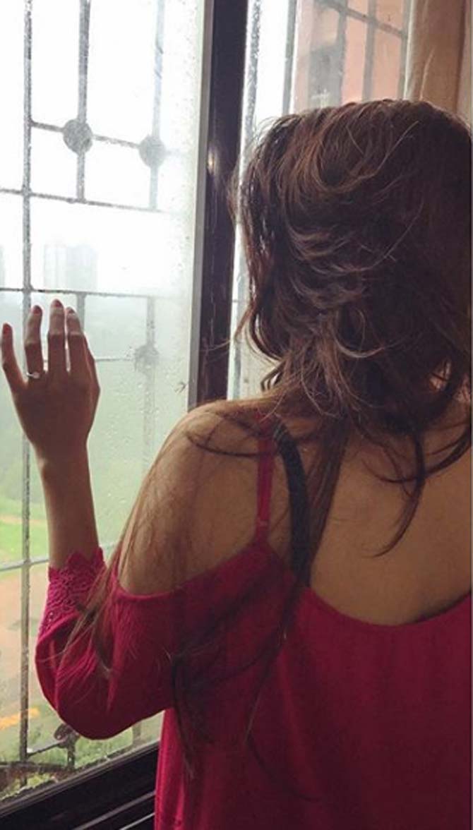 Pankhuri Sharma shows off her back in this photo, she hashtagged, '#mumbairains #dreamyweather #love'