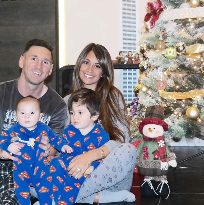 In picture: Lionel Messi and Antonella Roccuzzo with their sons Thiago and Mateo during Christmas