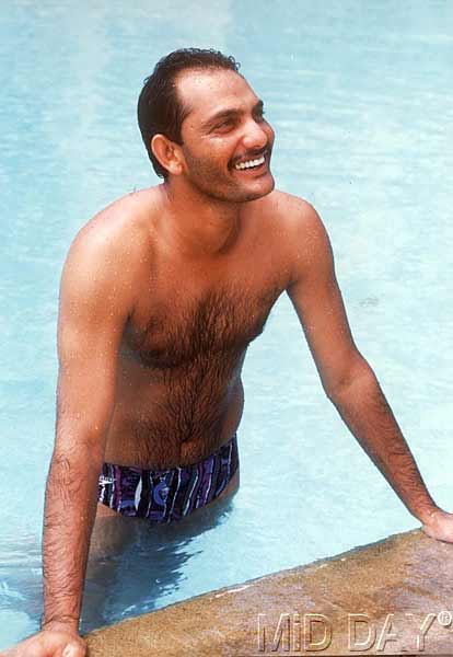 In picture: Mohammad Azharuddin enjoys some pool time
