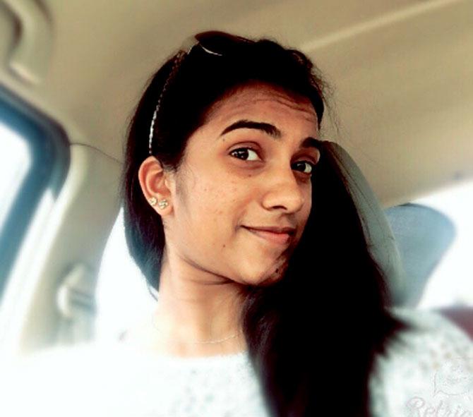 PV Sindhu taking a selfie in a car