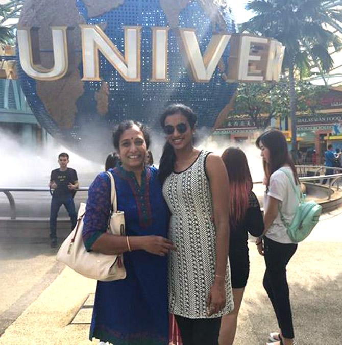 In picture: PV Sindhu with her mother at the Universal Studios in the United States