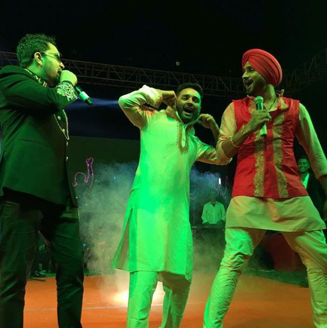 Parthiv Patel shaking a leg with Harbhajan Singh in this picture.