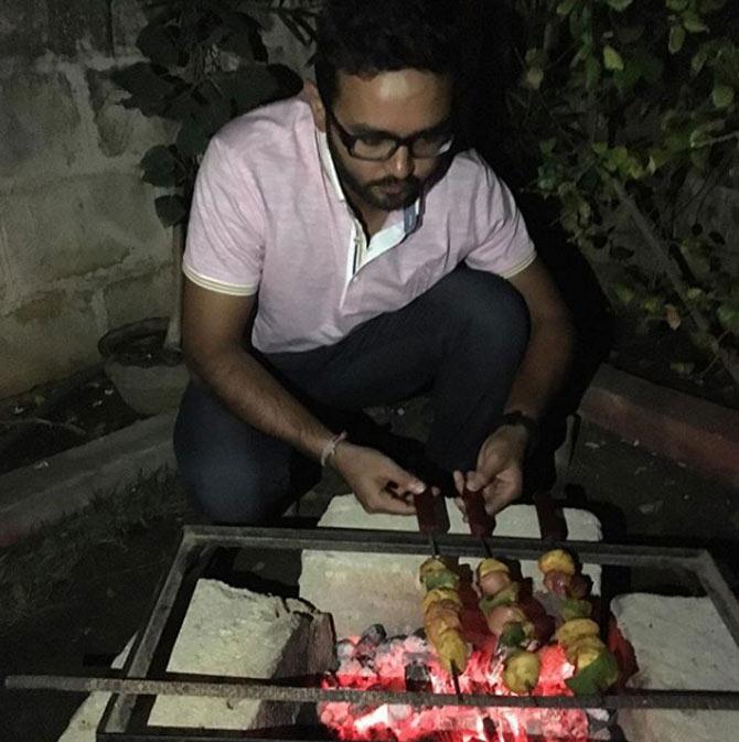Parthiv Patel tries his hand at cooking in this picture. His caption was quite a rib-tickler: From behind the stumps to behind the barbecue.