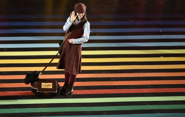 A Scottish terrier dog is lead out ahead of the Monserrat delegation
