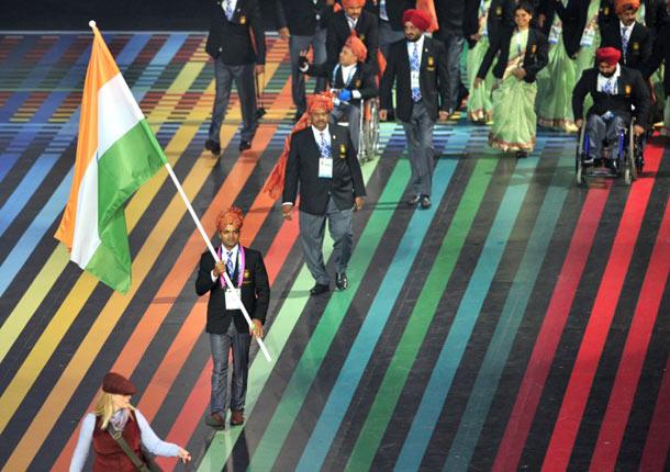 India's flagbearer Vijay Kumar leads his delegation during the opening ceremony