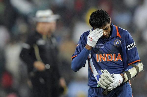 Rahul Dravid walks back to the pavillion after being run out on September 26, 2009 during the ICC Champions Trophy group match between Pakistan and India