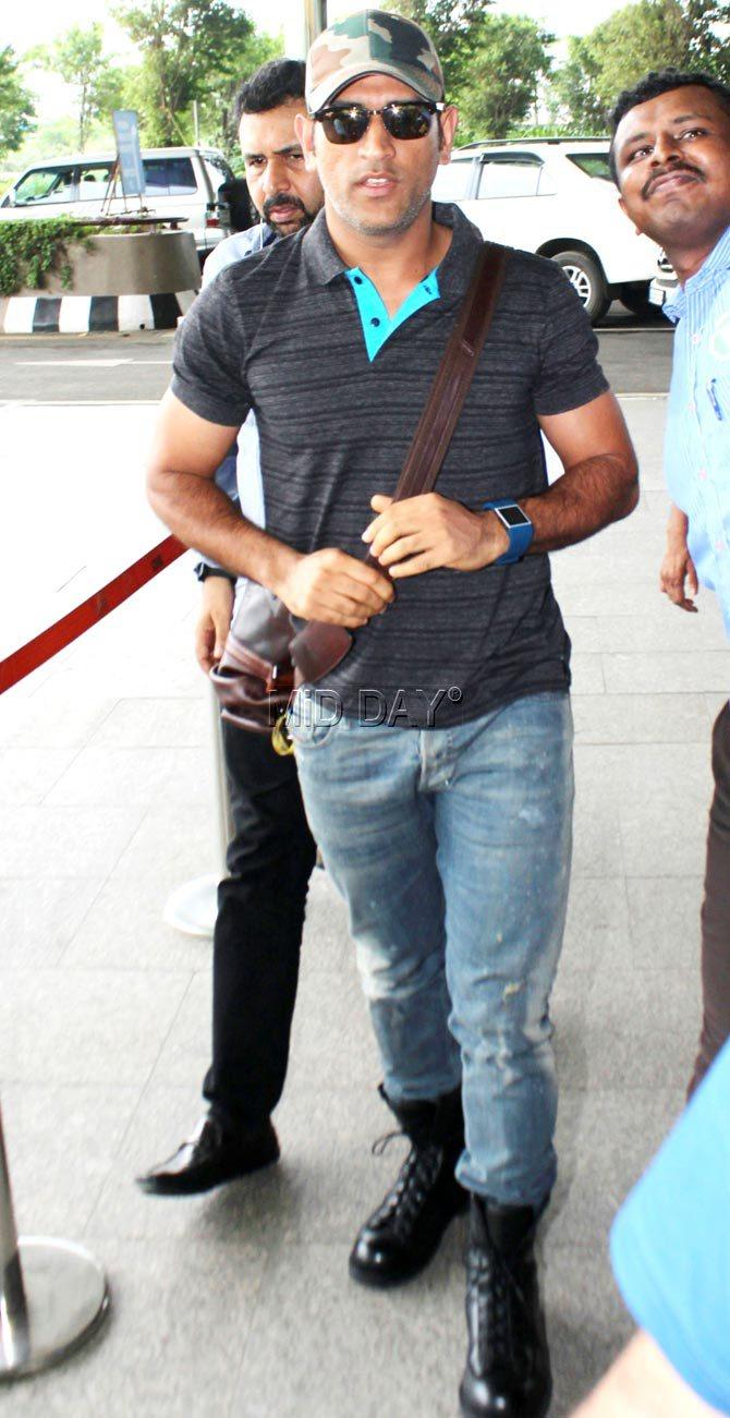 The cool part of his attire was his military cap! And don't miss his black boots