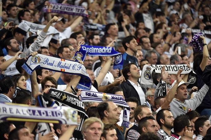 Real Madrid fans celebrate their team's victory