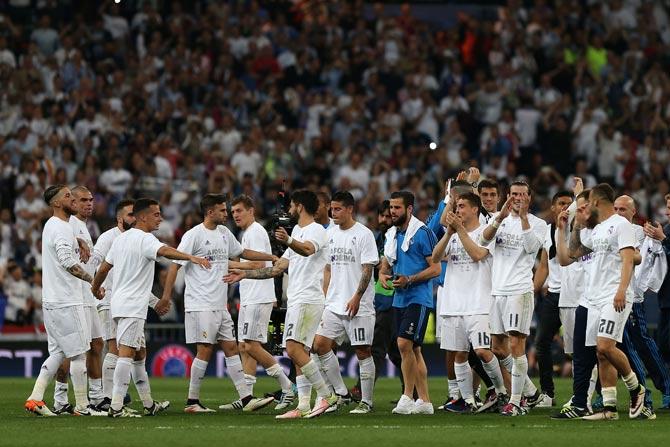 Real Madrid players celebrate their victory