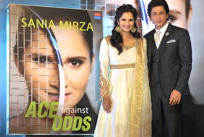 Tennis player Sania Mirza and actor Shahrukh Khan during the release function of 'Ace against Odds' an autobiography of Sania Mirza in Hyderabad. (Pics/ AFP/ PTI)