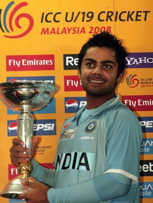 Then India skipper Virat Kohli holds the u-19 World Cup trophy after beating South Africa in the finals at the Kinrara stadium in Kuala Lumpur on March 2, 2008. Pic/AFP
