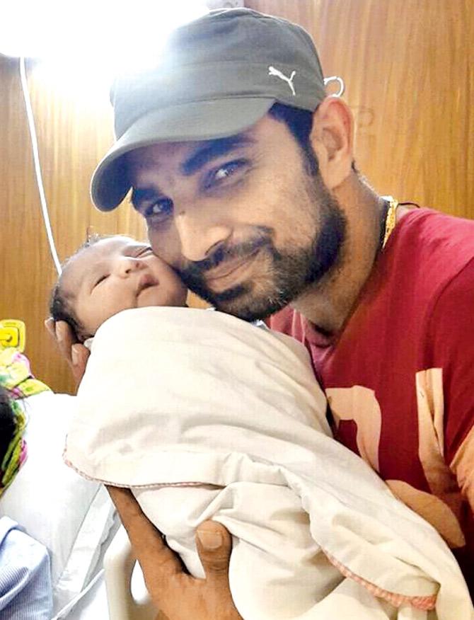 Bundle of joy: Mohammed Shami with his newly-born baby girl in July 2015. Pic/ Facebook fan page