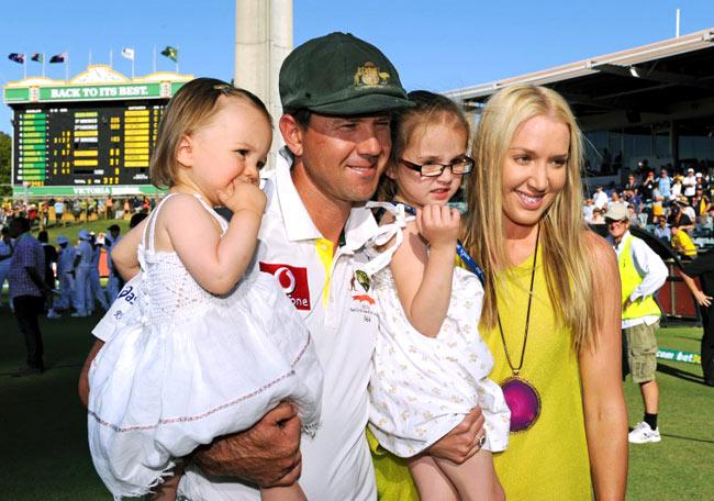 Australia's Ricky Ponting holds daughter Matisse (L), as his wife Riannna holds daughter Emmy (R), following the third Test match (Pontingâ,Â,Â,u00c2u0080Â,Â,u00c2u0099s last) between South Africa and Australia at the WACA ground in Perth on December 3, 2012. Pic/ AFP