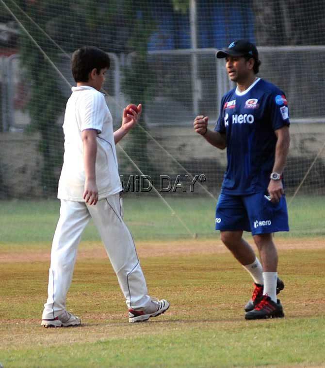 Master Blaster Sachin Tendulkar at the nets along with his son Arjun at MIG club, Bandra on October 28, 2012 Pic / Satyajit Desai