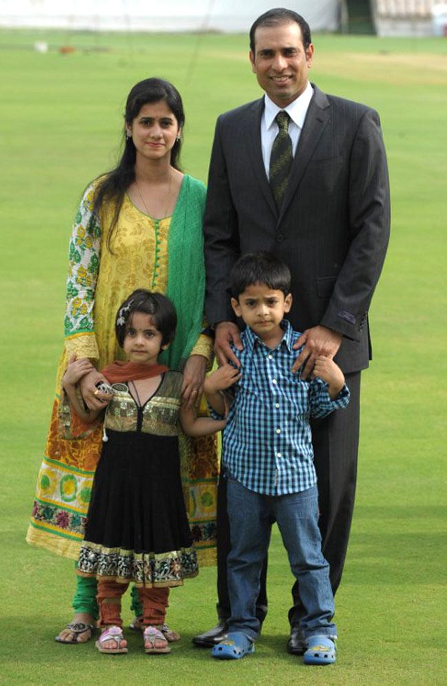 Former Indian cricketer VVS Laxman, wife Sailaja with children Sarvajith and Achinthya, pose for a photograph before a press conference held to announce his retirement from Test Cricket at the Rajiv Gandhi International cricket stadium in Hyderabad on August 18, 2012. Pic/ AFP