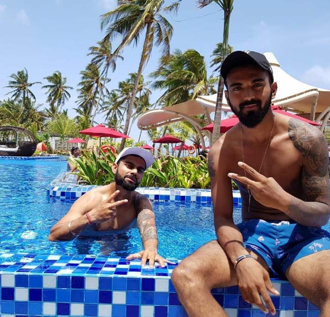Kohli and KL Rahul show off their built while posing by the pool