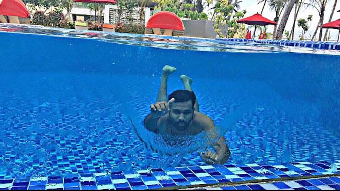 Rohit Sharma doing what he does best on an off-day - swim!