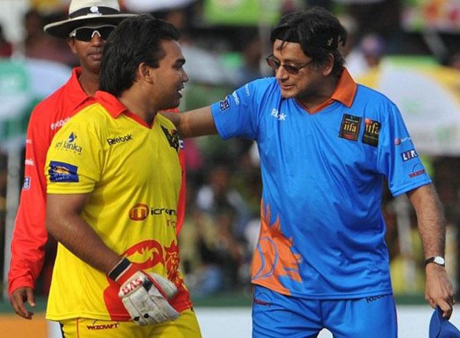 Namal Rajapakse (L), son of Sri Lankan President Mahinda Rajapakse, speaks with Indian politician Shashi Tharoor during a cricket match between Indian Bollywood actors and Sri Lankan cricketers during the three-day International Indian Film Academy (IIFA) awards events in Colombo on June 4, 2010. 