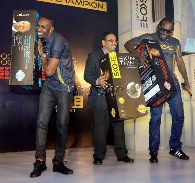 Jamaican-born Gayle and Trinidadian team mate Bravo, danced the champion dance and held giant sized boxes of the condoms on which their images and signatures appear.